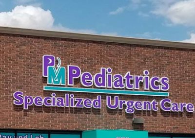 PM Pediatrics Specialized Urgent Care Sign
