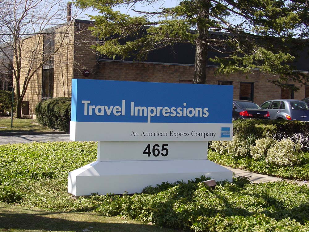 Travel Impressions Sign