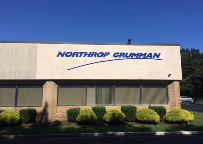 Northrop Grumman Sign Board On Wall